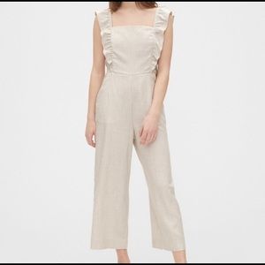 Greige ruffle jumpsuit with white stripes
